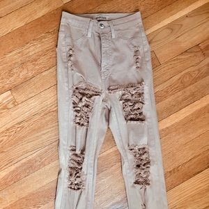 high waisted beige ripped skinny jeans